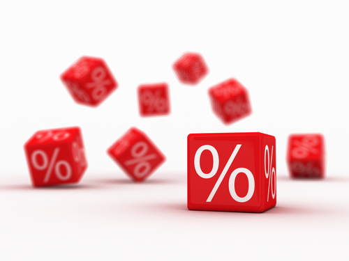 Symbols Of Percent On Falling Red Cubes.