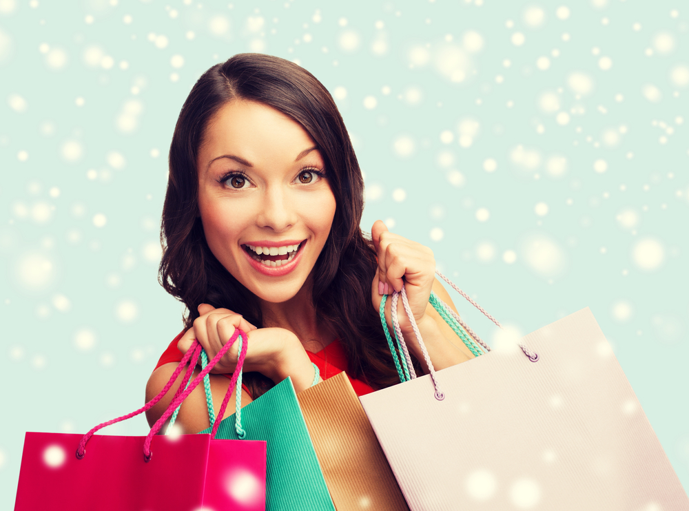 Shopping, Sale, Gifts, Christmas, X-mas Concept - Smiling Woman In Red Dress With Shopping Bags